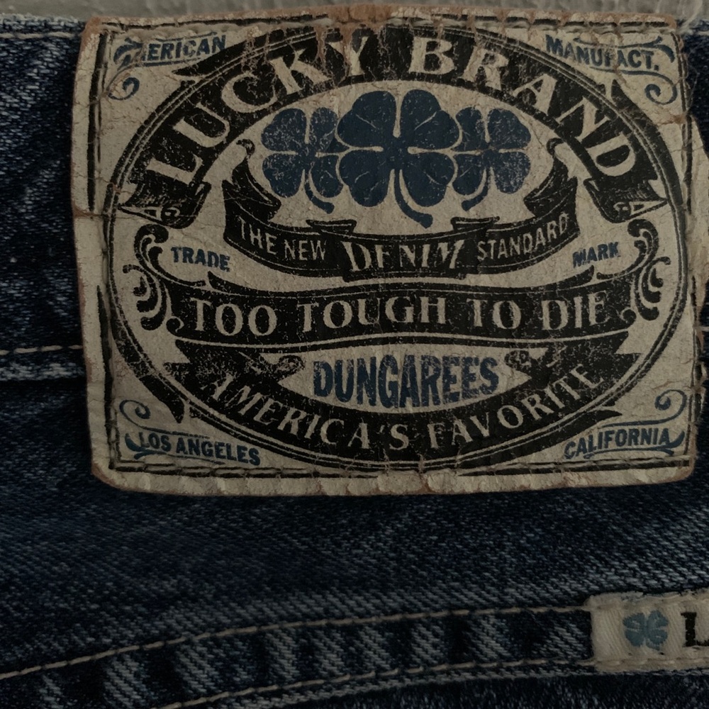 Pair of Lucky Brand button fly jeans, sz 5 wm’s.